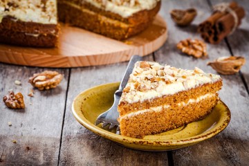 Wall Mural - Piece of homemade carrot cake with walnuts