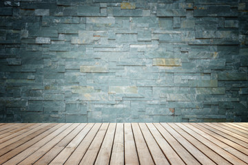 Wall Mural - Empty top of wooden floor and natural stone wall