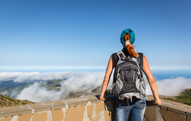 Wall Mural - Young girl in mountains