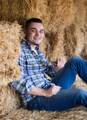 Wall Mural -   farmer  holding phone at shed