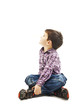 © Jelena Ivanovic - Portrait of a cute little boy sitting on the floor, looking up. Isolated on white background