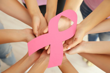 Poster - Women hands joined in circle holding breast cancer symbol