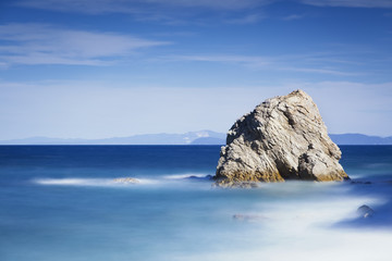 Wall Mural - Rock in a blue sea. Sansone beach. Elba island. Tuscany, Italy,