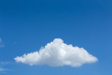 Single Cloud On Clear Blue Sky Background