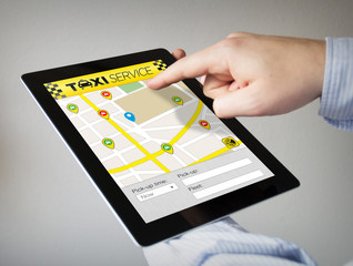 Canvas Print - taxi app on a tablet