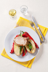 Sticker - Roasted pork chop with  potato and red peppers