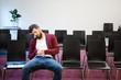 © Drobot Dean - Bearded guy sitting and sleeping in conference room