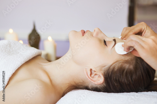 Fotografie, Obraz Relaxed woman with a deep cleansing nourishing face mask applied