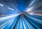 Fototapeta Dziecięca - Motion blur of train moving inside tunnel in Tokyo, Japan
