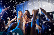 © Syda Productions - happy young women singing karaoke in night club