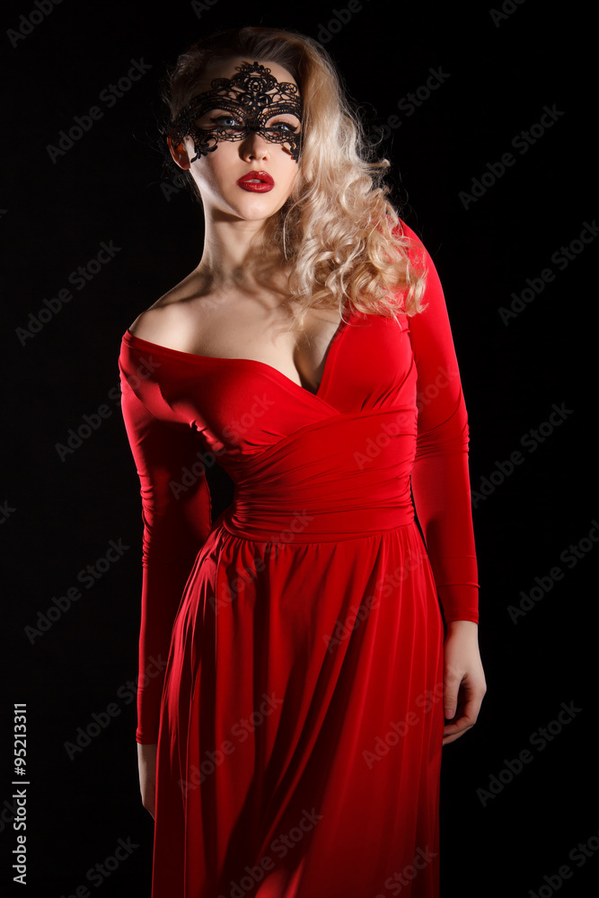 Young lady in a red evening dress and a black mask Stock Photo | Adobe Stock Young lady in a red evening dress and a black mask Stock Photo | Adobe Stock