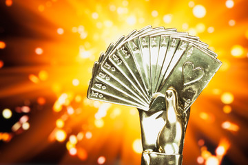 Wall Mural - poker cards trophy against shiny sparks background