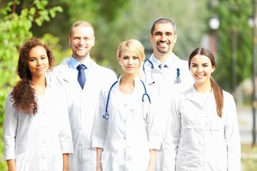 Canvas Print - Happy young medics, outdoors