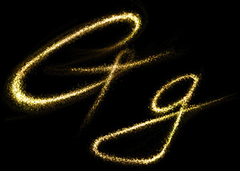 Wall Mural - g letter of gold glittering stars dust flourish tail