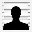 Silhouette of  anonymous man in mugshot or police lineup backgro
