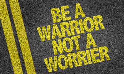 Be a Warrior Not a Worrier written on the road