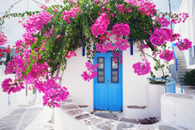 Traditional Greek House With Flowers In Paros Island, Greece.