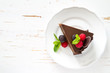 © anaumenko - Chocolate cake on white plate