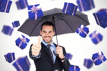 Canvas Print - Composite image of positive businessman under umbrella