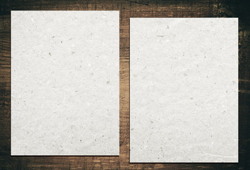 Wall Mural - gray recycled papers are on grunge wooden board