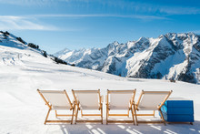 Empty White Deck Chairs In Mayrhofen Ski Resort, Austrian Alp