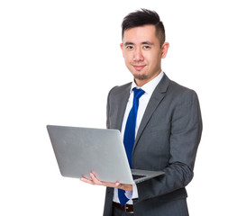 Canvas Print - Asian Businessman use of the laptop computer