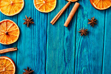 
Blue Wooden Background With Orange , Cinnamon And Spices