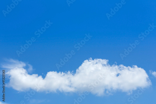 Obraz w ramie single cloud on clear blue sky background