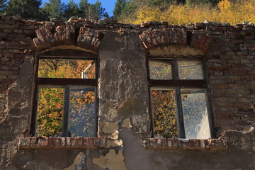 Two destroyed windows in small town near Sarajevo