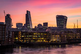 Fototapeta  - Night photo of London silhouette, offices by the Thames river 