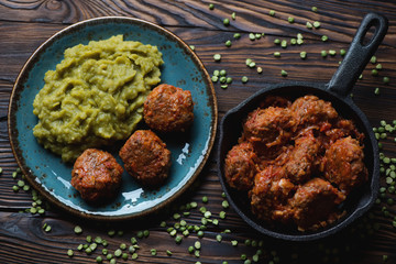 Poster - Meatballs with green peas, studio shot, above view