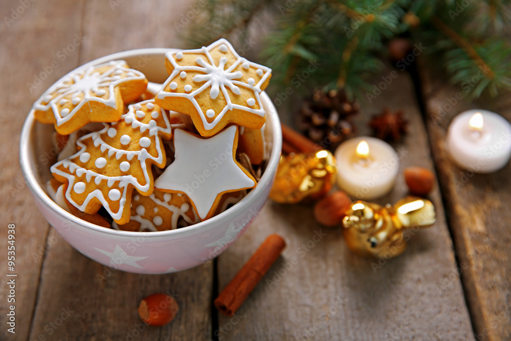 Cookies with spices and Christmas decor, on wooden table