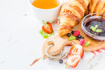 Wall Mural - Breakfast - croissants with berries