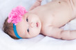 © A.Kazak - small cute baby girl with a adorable flower in her head