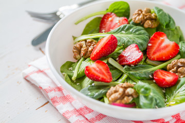 Wall Mural - Strawberry salad in white bowl