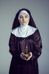 Wall Mural - Nun with candle.