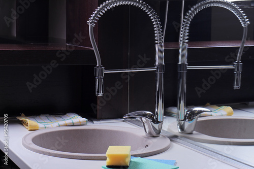 Close Up Of Modern Kitchen Faucet And Sink Industrial Style