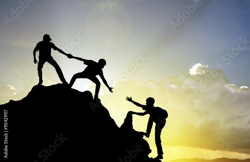 Fotografie, Obraz climbing helping team work , success concept