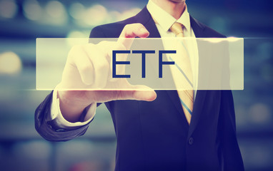 Poster - Business man holding ETF