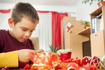 Wall Mural - Happy young family getting ready for the Advent, Christmas holid