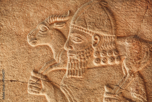 Fotomural Historical Assyrian relief of farmer with goat from Pergamon museum
