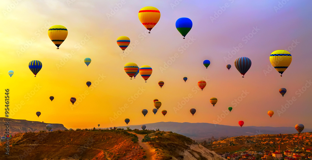 Hot air balloon flying mountain valley Göreme National Park and the Rock Sites of Cappadocia Turkey - obrazy, fototapety, plakaty 
