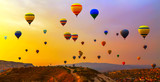 Hot air balloon flying mountain valley Göreme National Park and the Rock Sites of Cappadocia Turkey
