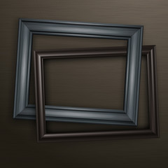 Two wooden black frames for picture on dark background, 