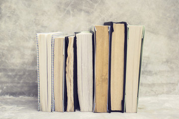 Poster - Book series on concrete shelf