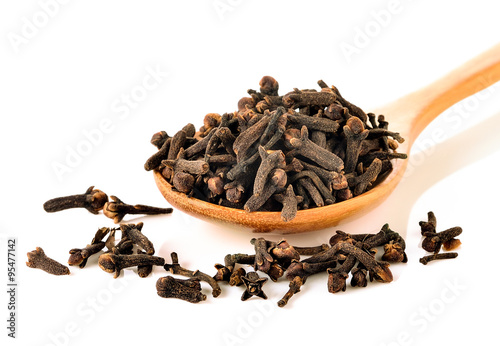 Fotografie, Obraz Spice cloves in the spoon on white background