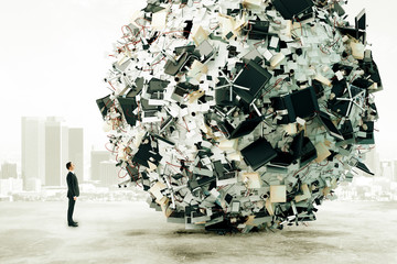 businessman is looking at the big load of office work