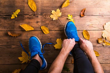 Wall Mural - runner tying shoelaces