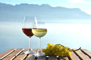 Wine and grapes against Geneva lake, Switzerland