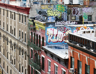 Fototapete - Buildings along a New York City block in Manhattan